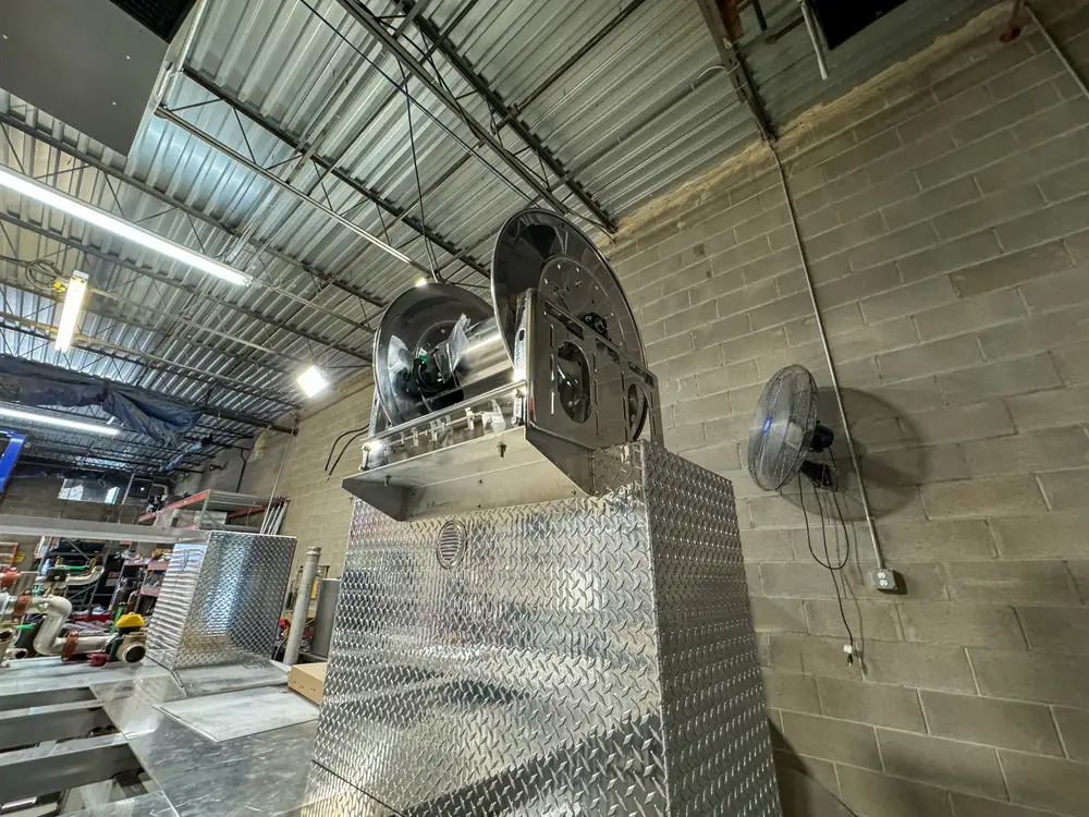 Apparatus in production bay with hood open, photo 191 of 303.